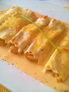 Una foto de Canelones rellenos de Langostinos y Setas variadas