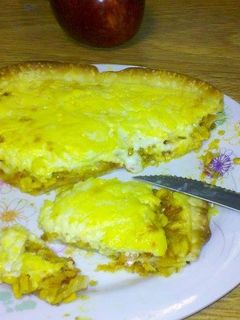 Una foto de Pastel de pan y queso