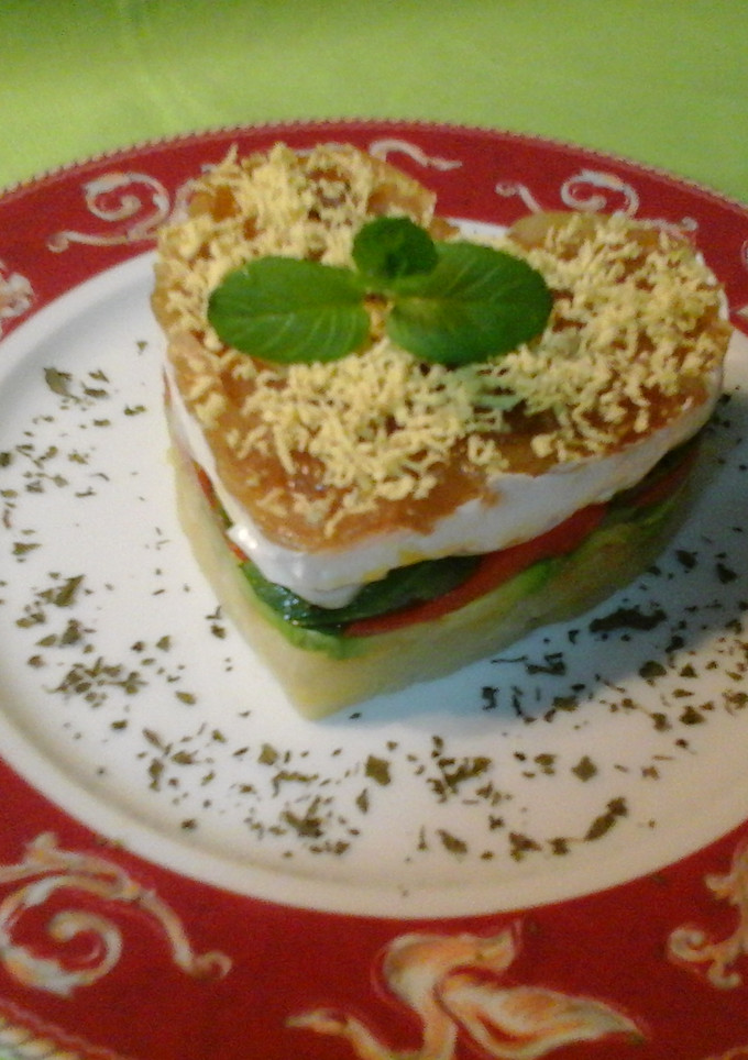Una foto de Timbal de verduras con queso de cabra