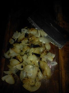 Una foto de Asado a la parrilla de cebollas