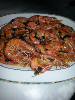 Una foto de Gambón al horno con ajo y perejil
