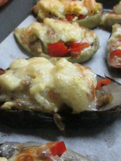 Una foto de Berenjenas y calabacines rellenos con su pulpa