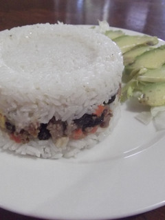 Una foto de Arroz tapado