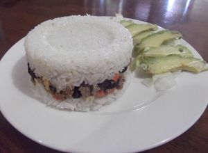 Una foto de Arroz tapado