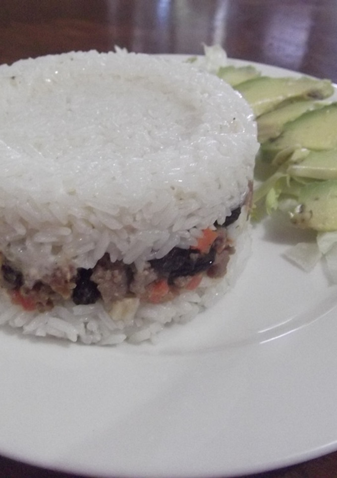 Una foto de Arroz tapado