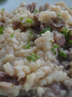 Una foto de Risotto de puntillas de calamar con mantequilla de ajo