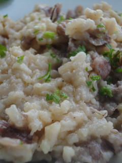 Una foto de Risotto de puntillas de calamar con mantequilla de ajo
