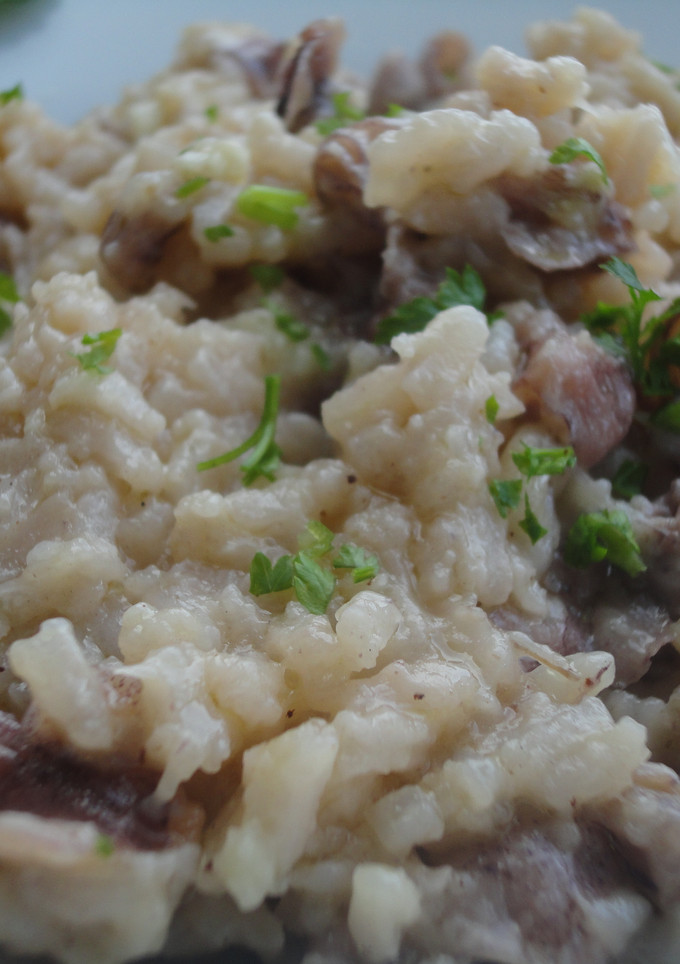 Una foto de Risotto de puntillas de calamar con mantequilla de ajo