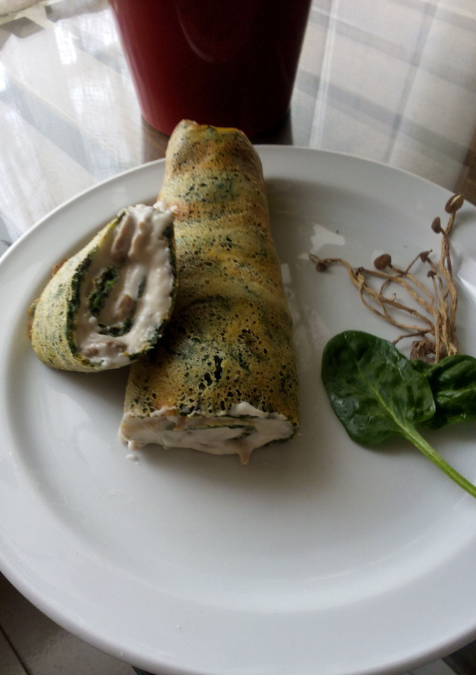 Una foto de Rollo de espinacas con bechamel de champiñones