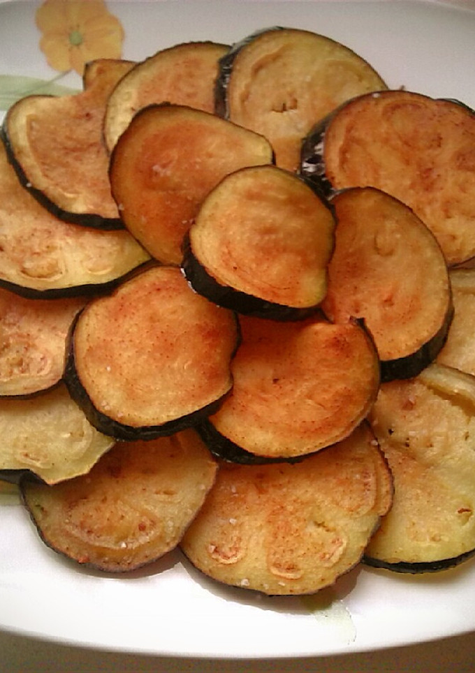 Una foto de Berenjenas fritas en wok