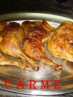 Una foto de Muslos de pollo asados al limón con pimiento asado
