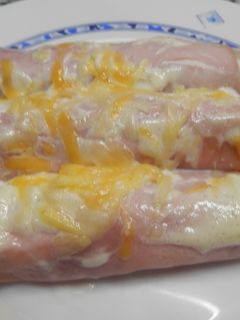 Una foto de Espárragos blancos con jamón cocido y gratinados con mayonesa