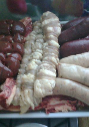 Una foto de Parrillada uruguaya con chotos 
