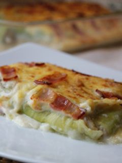 Una foto de Canelones de col gratinados con bacon