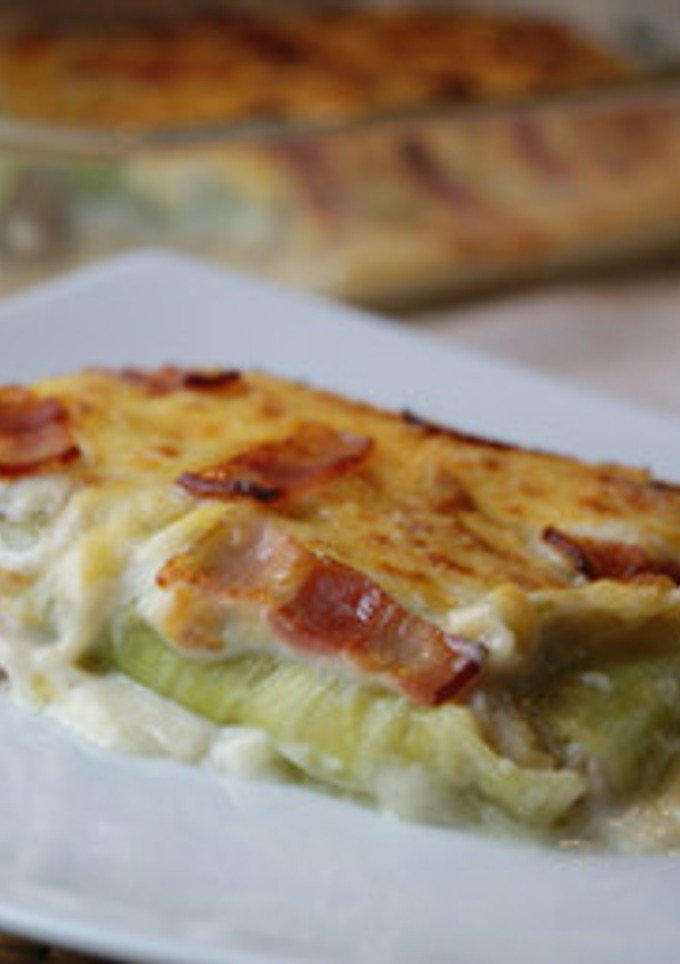 Una foto de Canelones de col gratinados con bacon