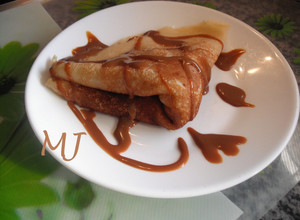 Una foto de Crepas con cajeta y/o dulce de leche