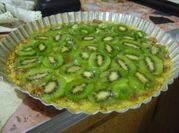 Una foto de tarta de kiwi