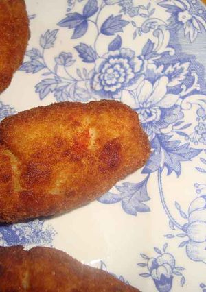 Una foto de Croquetas de arroz con queso