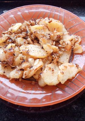 Una foto de Papas con cebolla