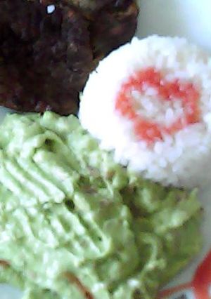 Una foto de Carne asada con arroz y guacamole decore