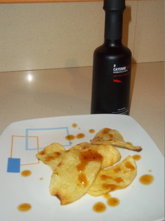 Una foto de Papas con aliño cayenne