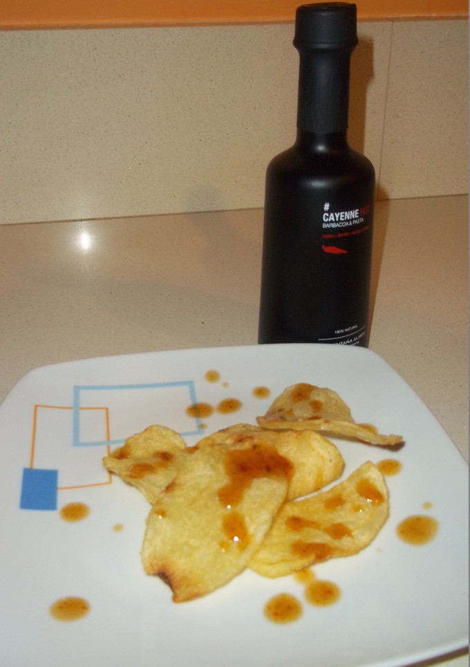 Una foto de Papas con aliño cayenne