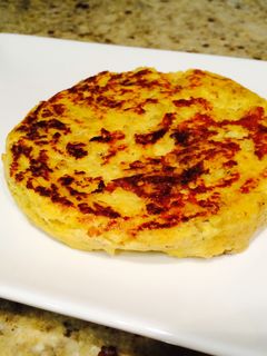 Una foto de Tortilla estilo española de calabaza, trufa y parmesano