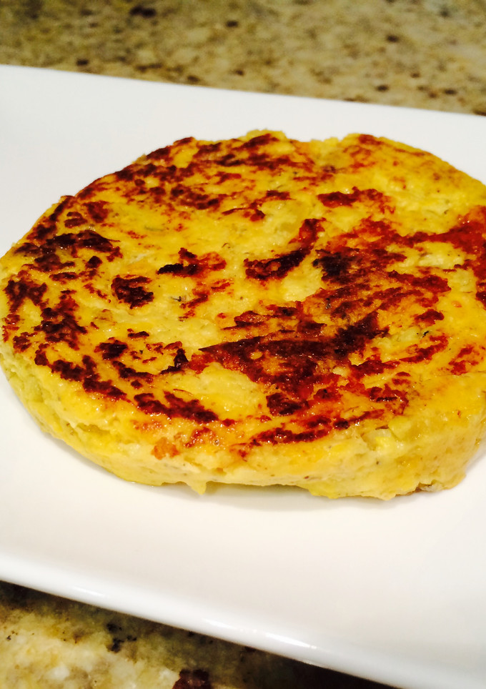 Una foto de Tortilla estilo española de calabaza, trufa y parmesano