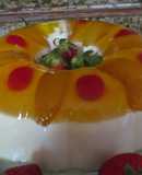 Gelatina de agua sabor piña con duraznos y tres leches