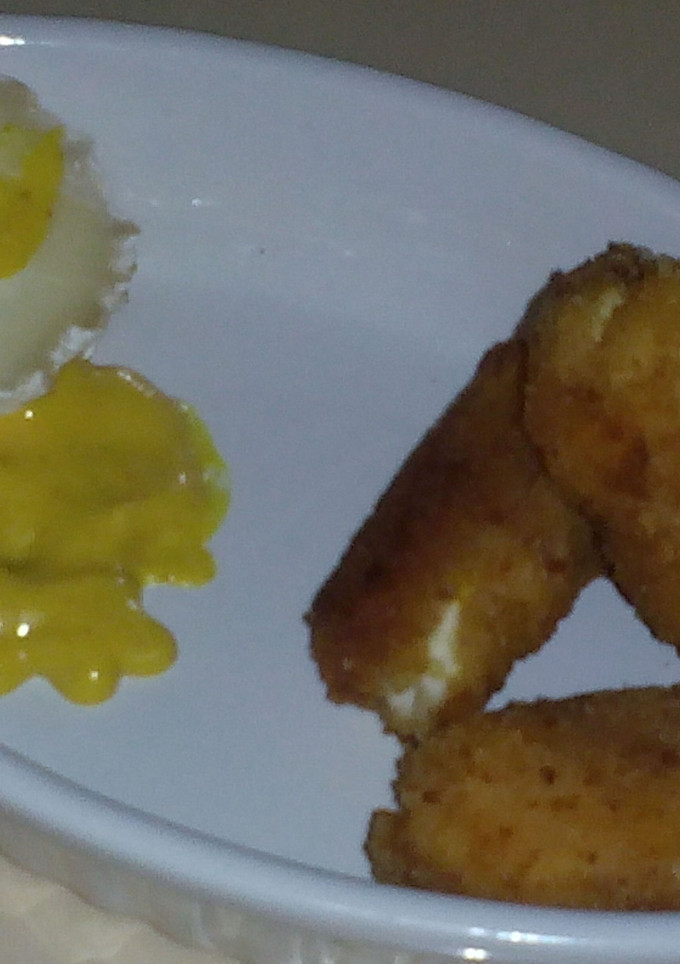Una foto de Croquetas de quesos y mango