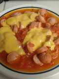 Salchichas con tomate en microondas
