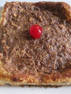 Una foto de Tarta crocante con ricotta morena