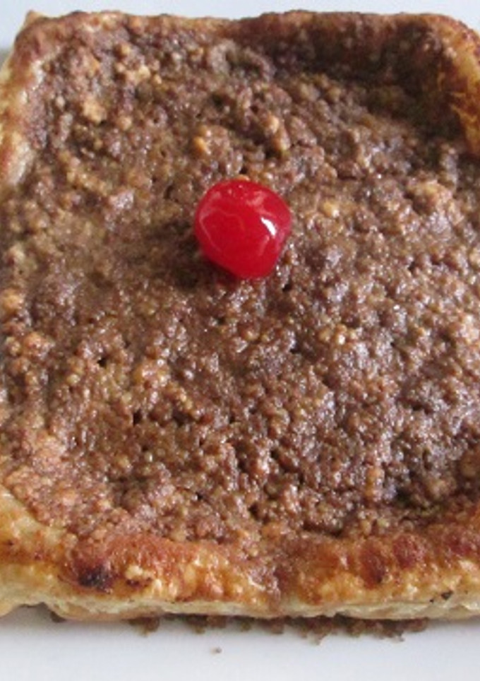 Una foto de Tarta crocante con ricotta morena
