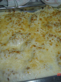 Una foto de Filetes con almendras y bechamel