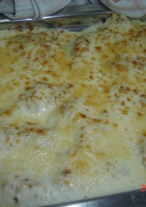 Una foto de Filetes con almendras y bechamel