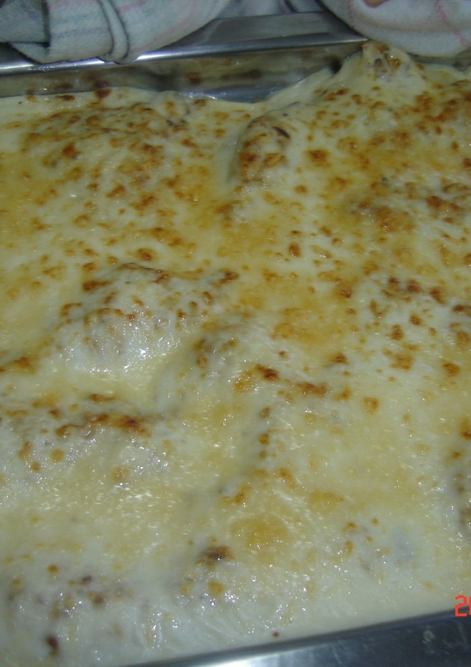 Una foto de Filetes con almendras y bechamel
