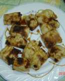 Paquetitos de pasta filo o brick de manzana y camembert