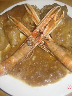Una foto de Pies de cerdo con escarmalanes
