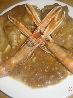 Una foto de Pies de cerdo con escarmalanes