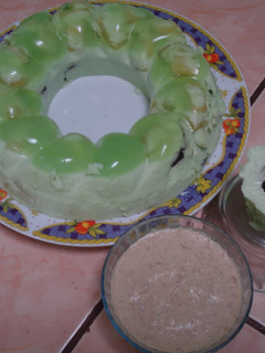 Una foto de Postre de Piña y limón con salsa al Ron