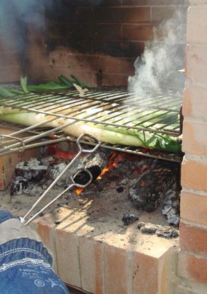 Una foto de Calçots rebozados
