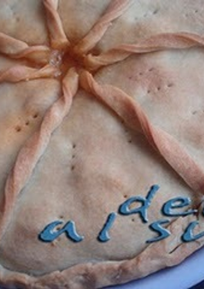 Una foto de Empanada de atún y pollo