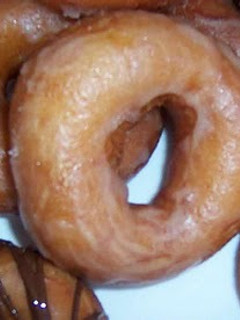 Una foto de Donuts caseros fritos