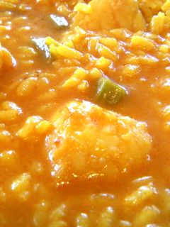 Una foto de Arroz caldoso con rape y tallos de alcachofa