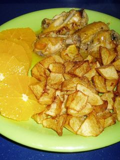 Una foto de Alitas de pollo a la naranja