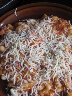Una foto de Alubias con queso gratinado