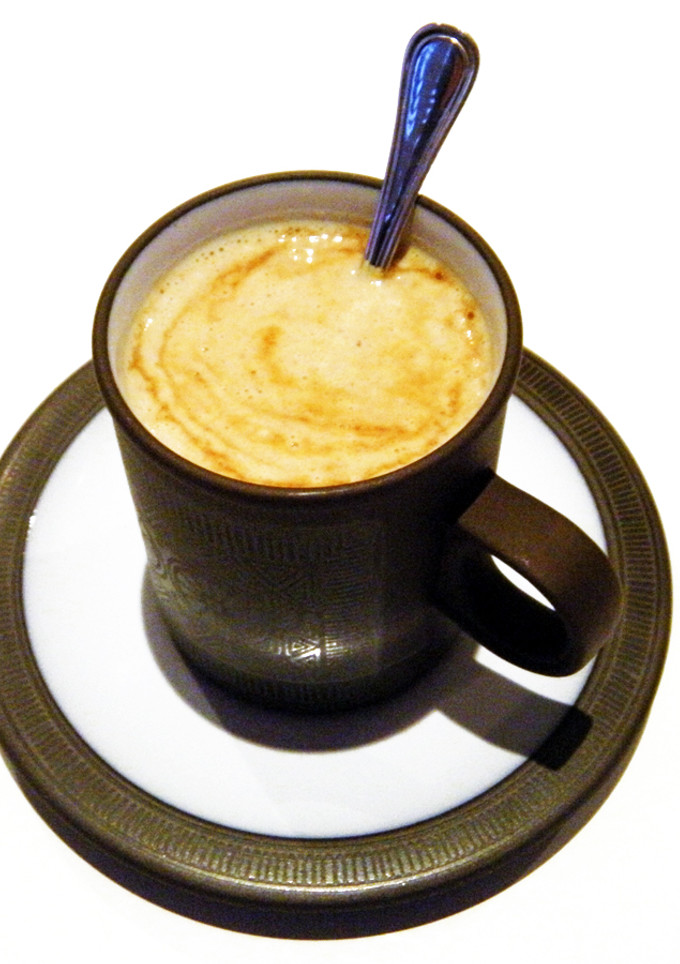 Una foto de Nueces con caramelo a la taza