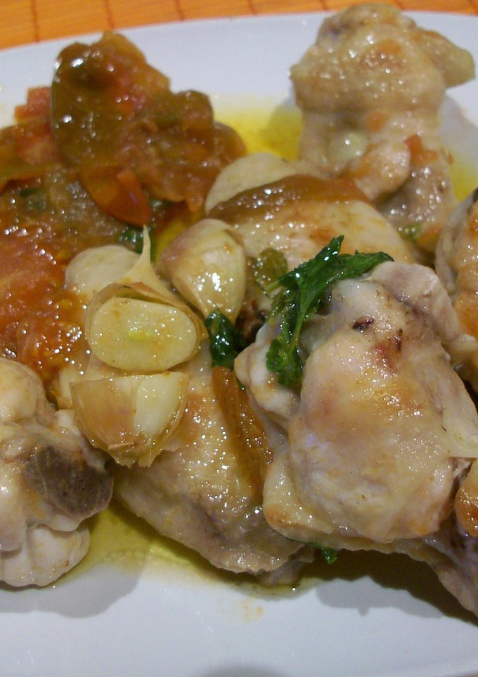 Una foto de Pollo sofrito con tomates de Muchamiel