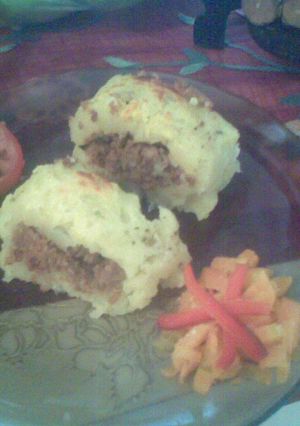 Una foto de Tubo de papa relleno de carne