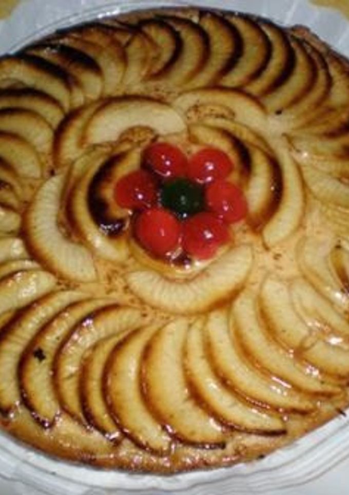 Una foto de Tarta de manzana con guindas